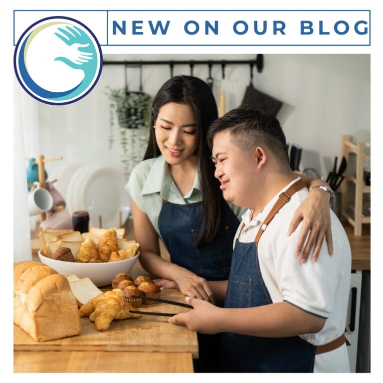 A man and woman in aprons cutting bread.