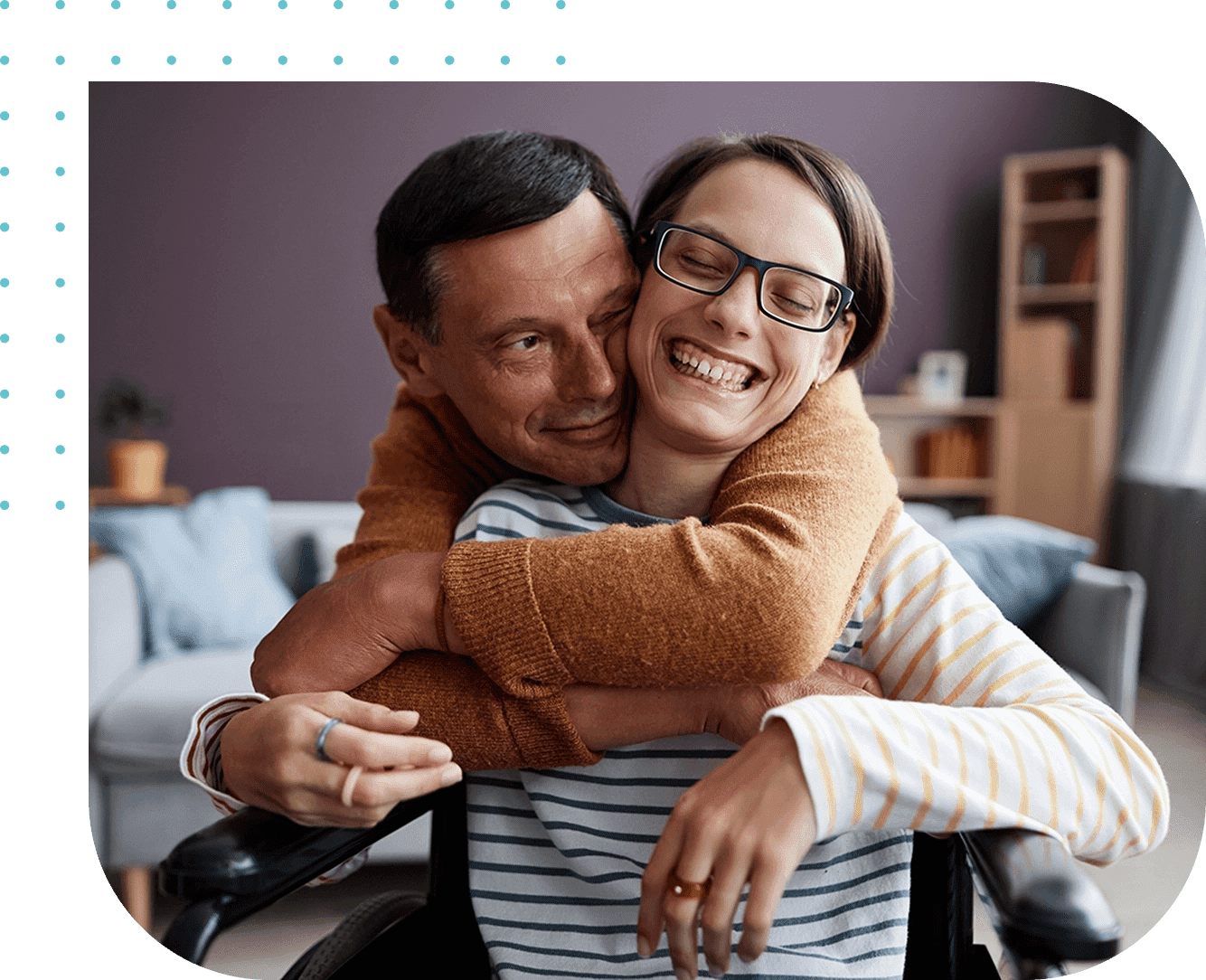 Img-003 A man and woman hugging in a living room.
