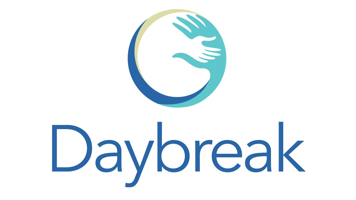 A blue and white logo of daybreak
