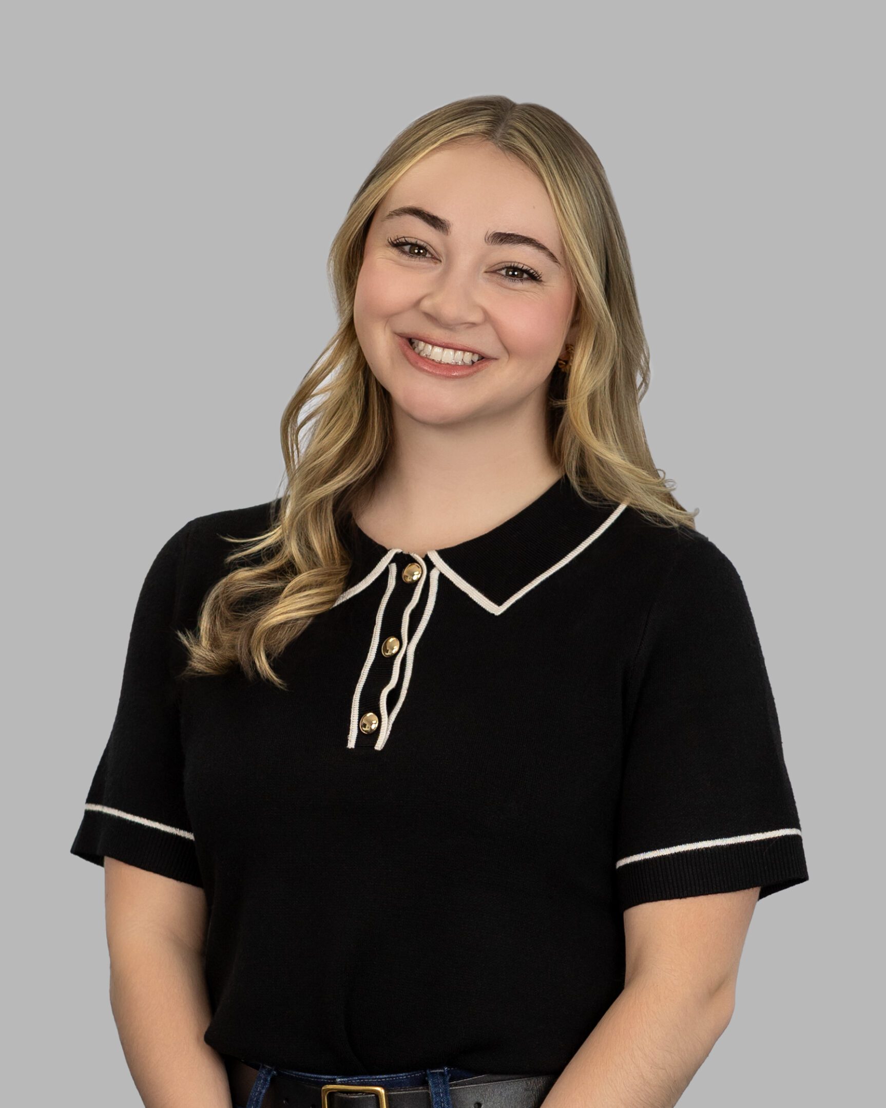 Alissa_Marvin-19-Print A woman in black shirt smiling for the camera.