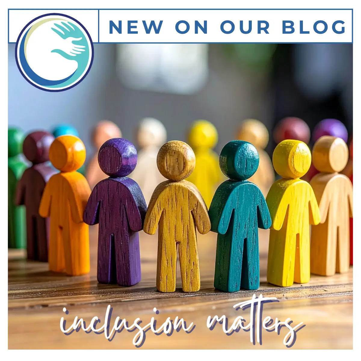 Colorful wooden figures promote inclusion message.